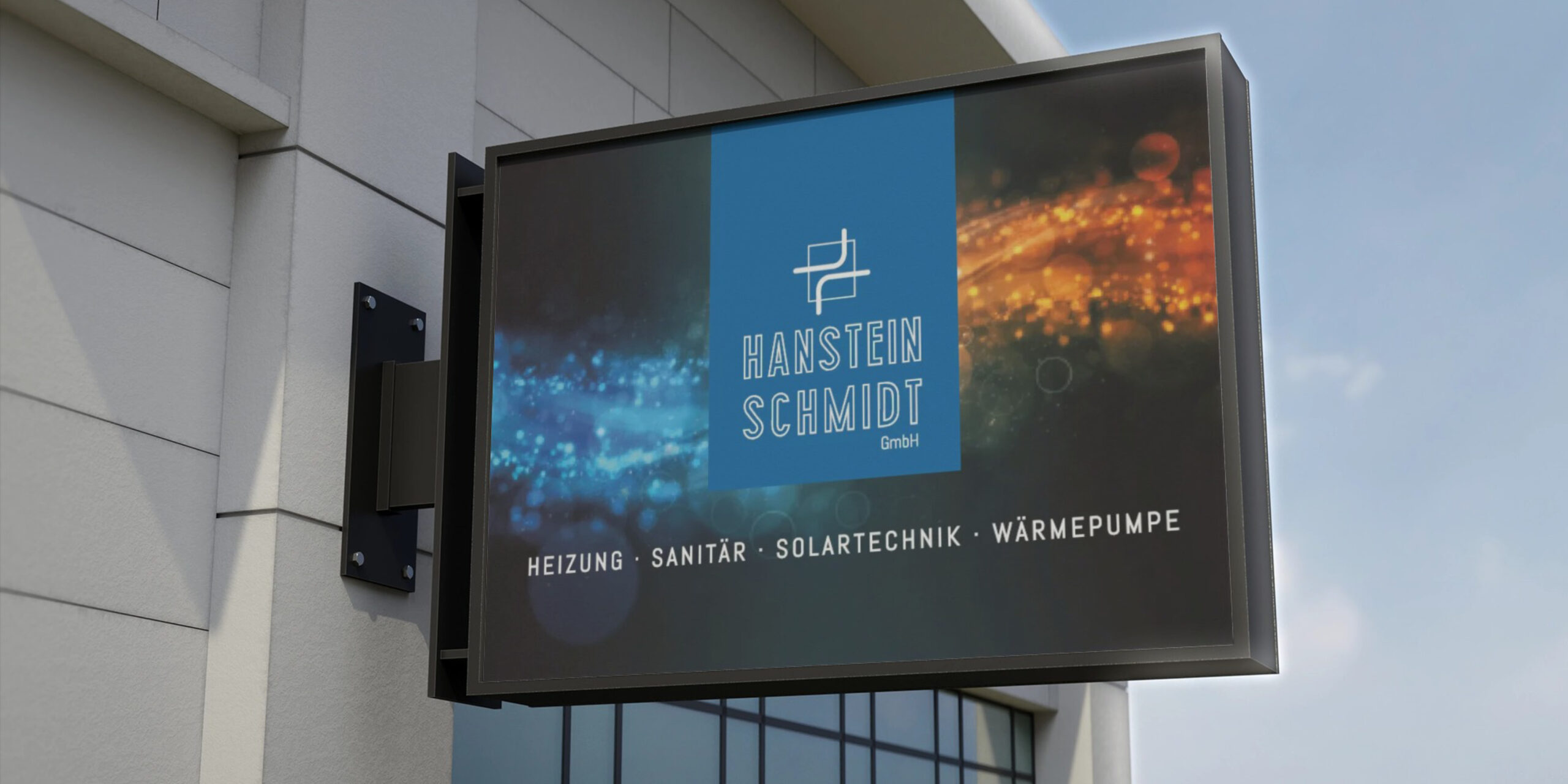 Außenschild Hanstein Schmidt GmbH an Hauswand